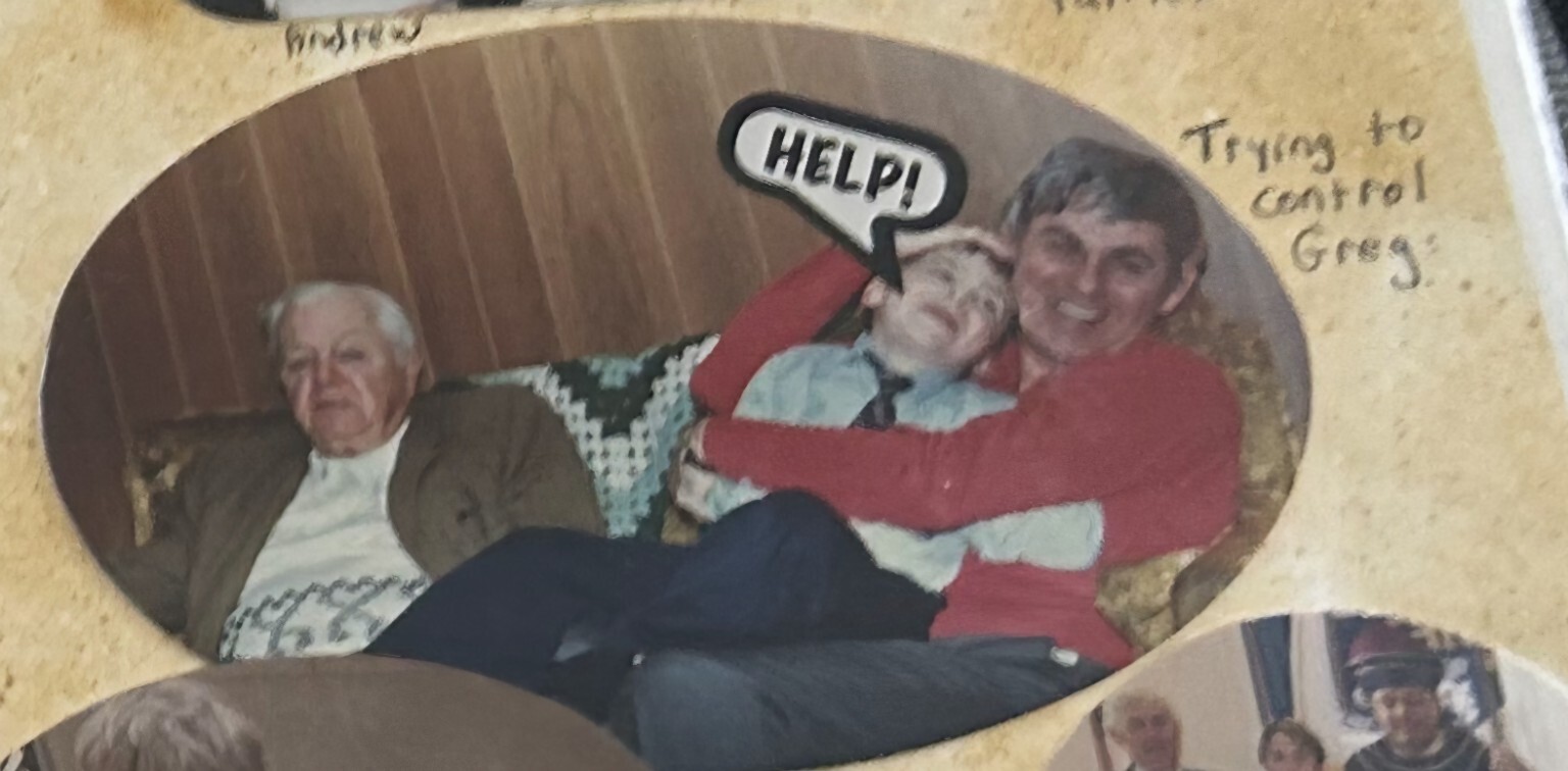 Captain Edward Davies, Robert Davies and young Greg Lefebvre on the couch at Allandale