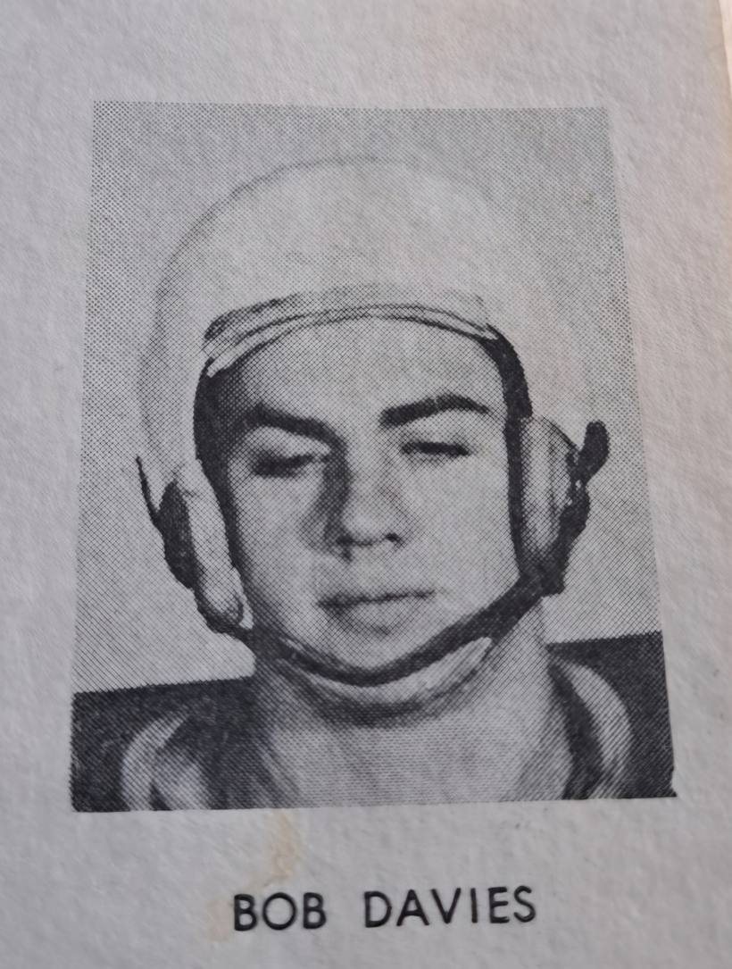 A halftone yearbook photo of a young man in a leather football helmet, captioned Bob Davies.