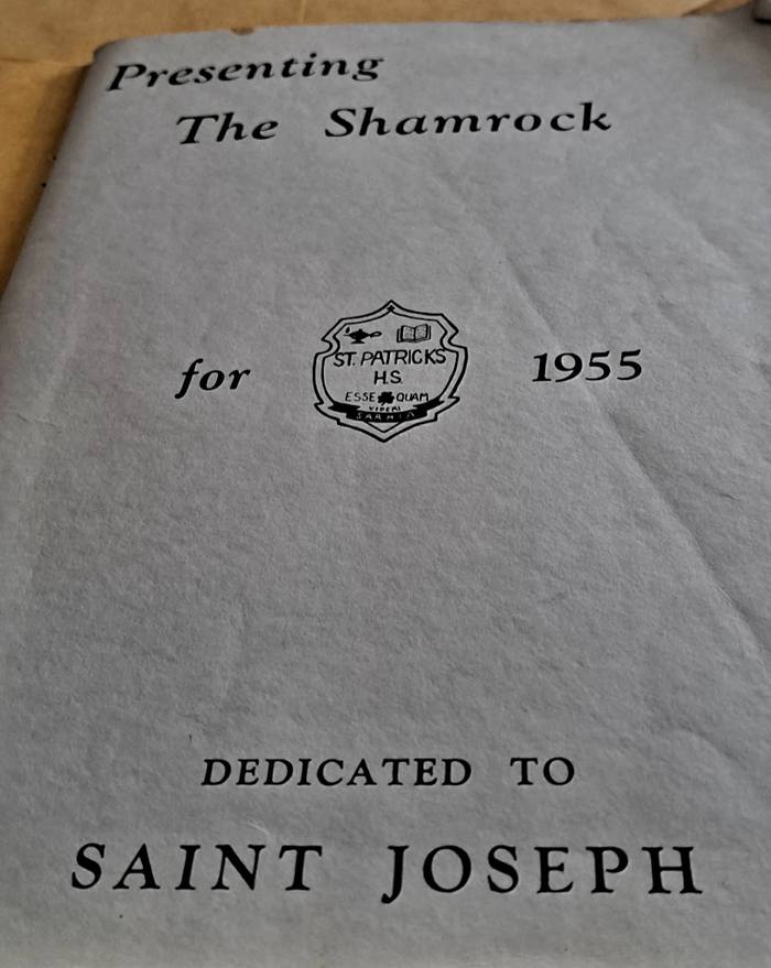 A grey yearbook cover reading Presenting The Shamrock for 1955, with the St. Patrick's H.S. crest.