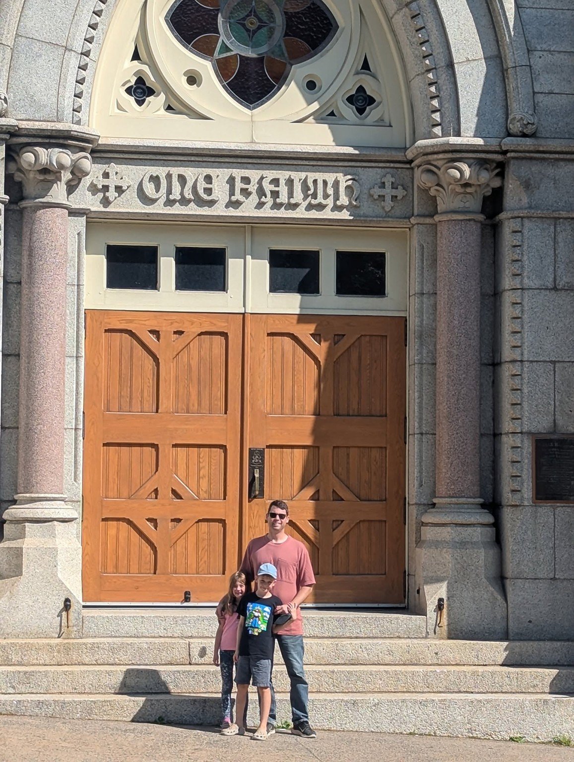 Michael Lefebvre with Sullivan and Lainey at Saint Mary's Cathedral