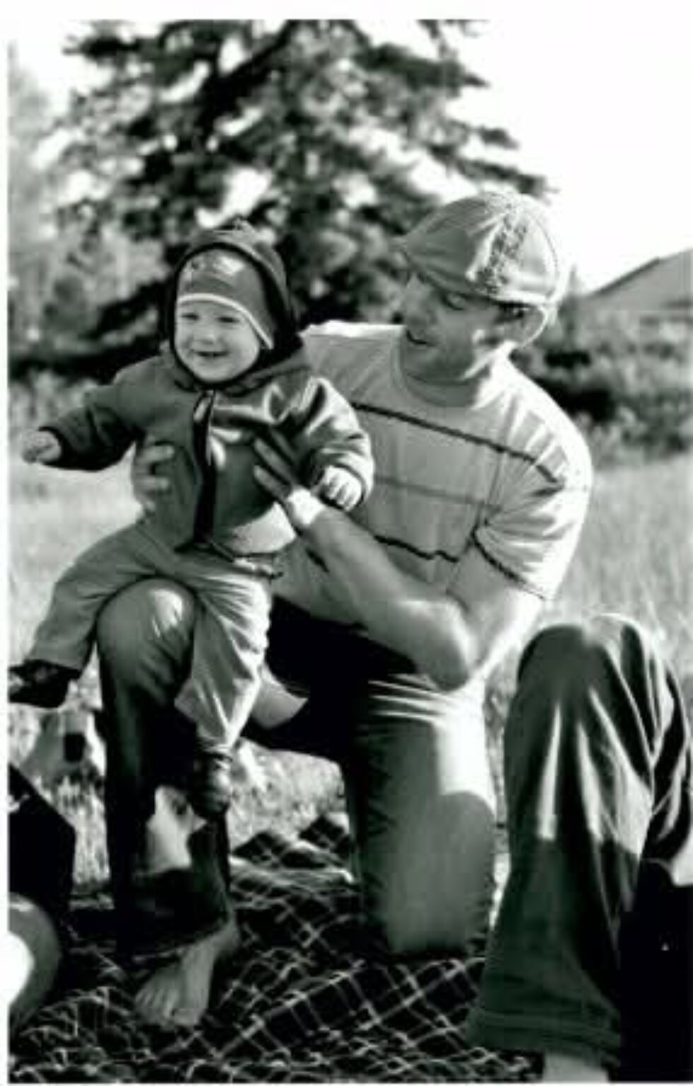 Brian Lefebvre holding one-year-old Jonte in Vancouver in 2010